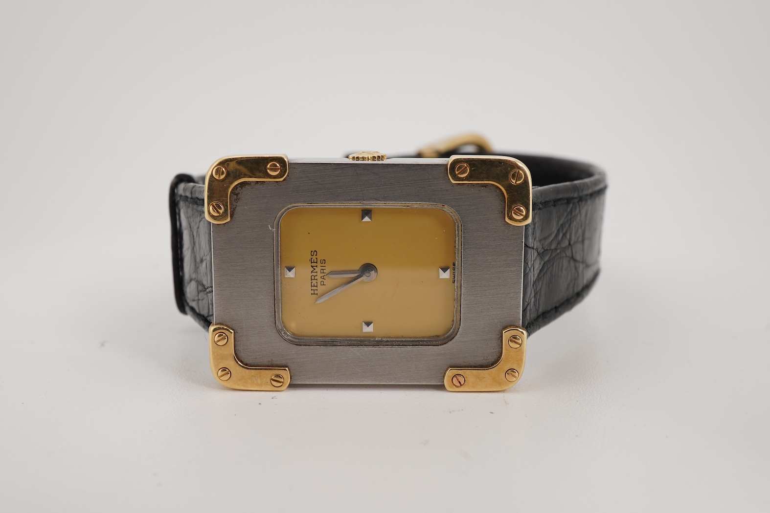 A 1970's/1980's stainless steel and gold Hermes manual wind wrist watch